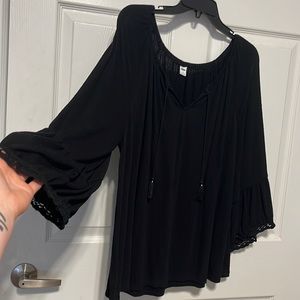 Slightly worn, long sleeve blouse